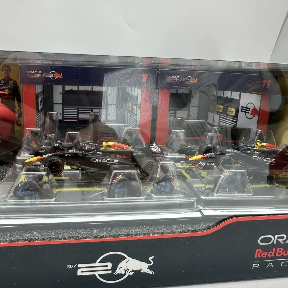 Burago 1:43 Formula 1 Deluxe Paddock Set Pit Crew Figures & Garage SP 11 Driver